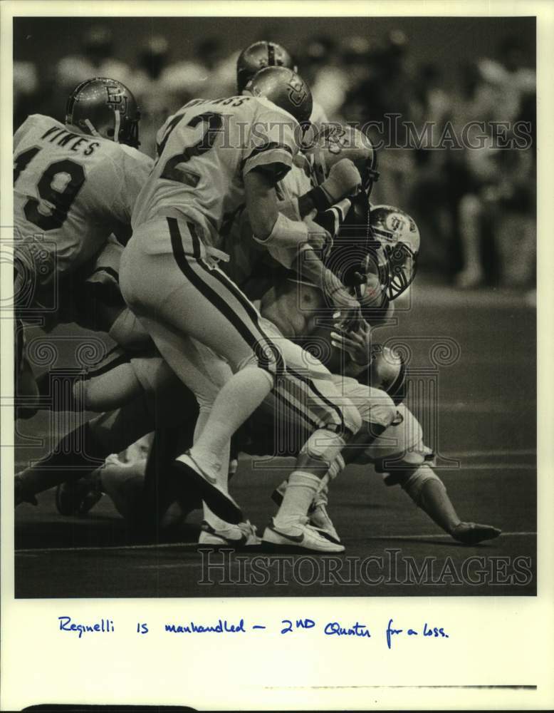 1982 Press Photo Football - Reggie Reginelli of Tulane is Manhandled- Historic Images