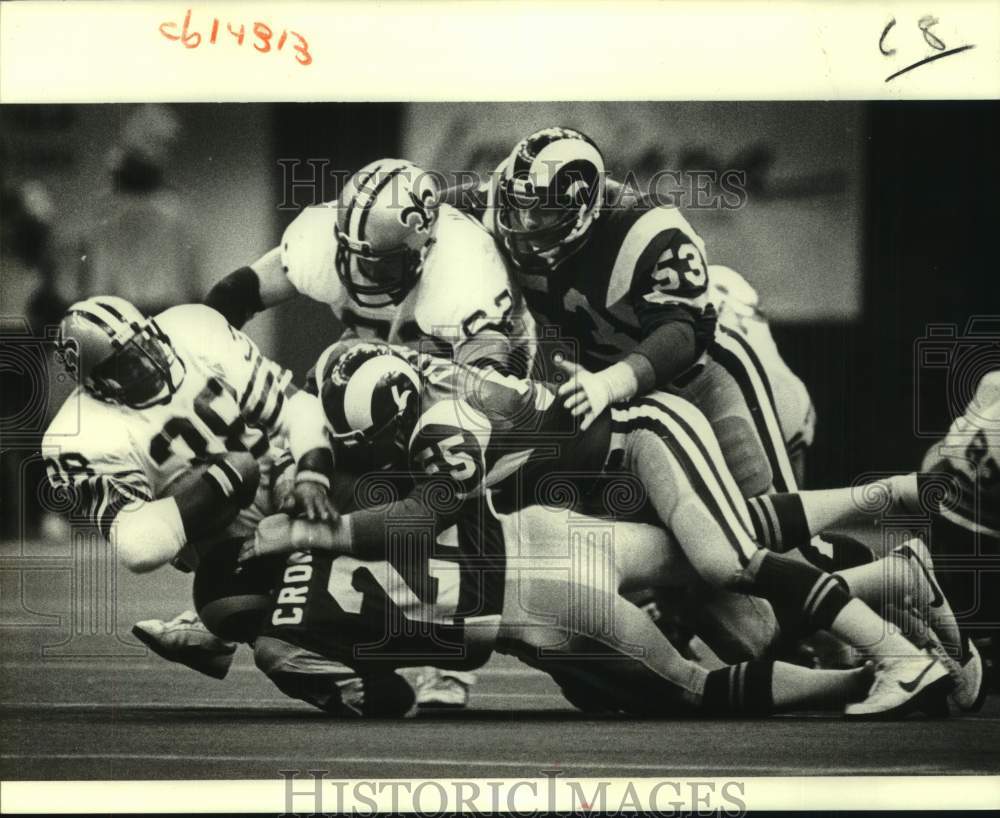 1981 Press Photo New Orleans Saints football player George Rogers is tackled- Historic Images