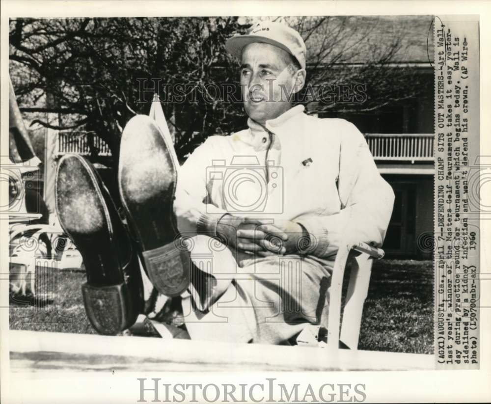 1960 Press Photo Golfer Art Wall Sitting Out Masters Tournament - nos32437- Historic Images