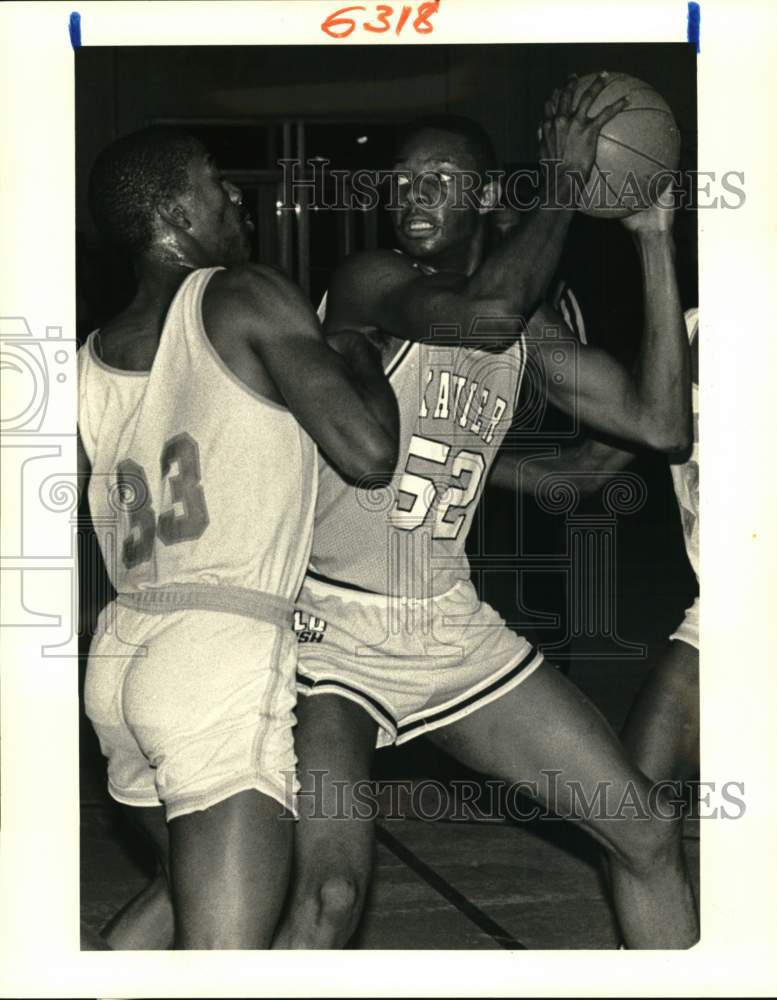 1987 Press Photo SUNO vs. Xavier Basketball Game - nos33213- Historic Images