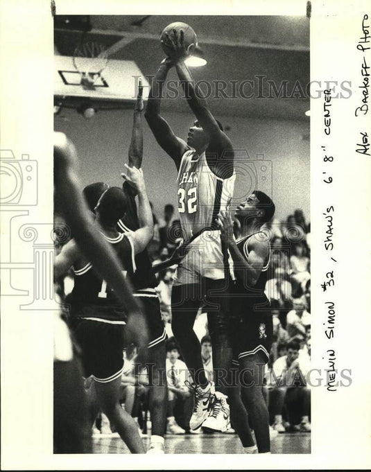 1989 Press Photo Shaw High School basketball 6'8" center Melvin Simon (32)- Historic Images