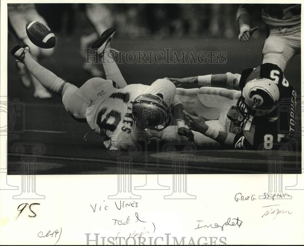 1982 Press Photo Football player Greg Stopher on the ground. - nos34792 - Historic Images