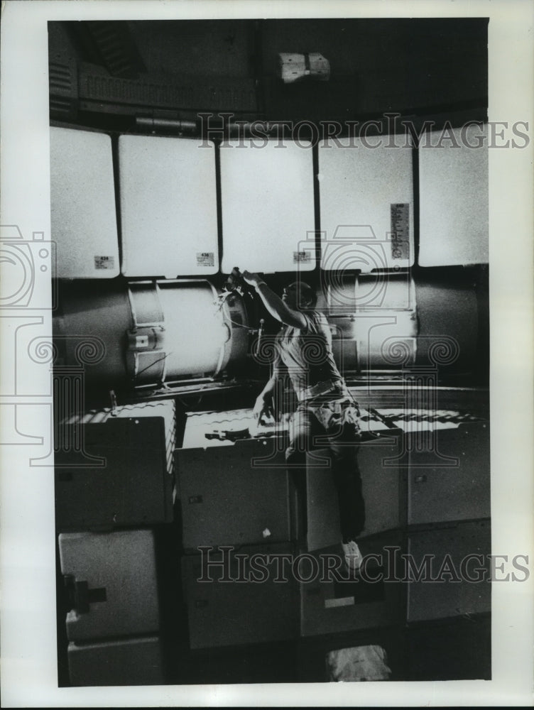 1973 Press Photo Skylab Orbital Space Workshop Camera Checked by Charles Conrad - Historic Images