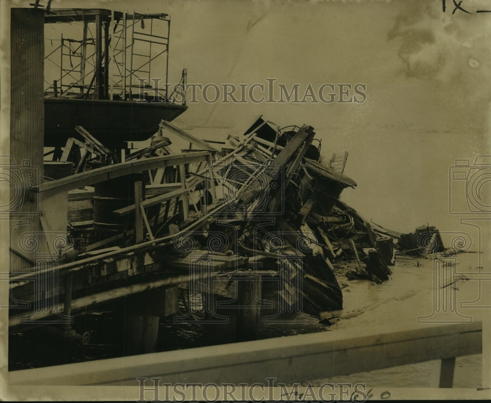 1966 Barges that broke loose wrecked a U.S. Engineers landing ramp - Historic Images