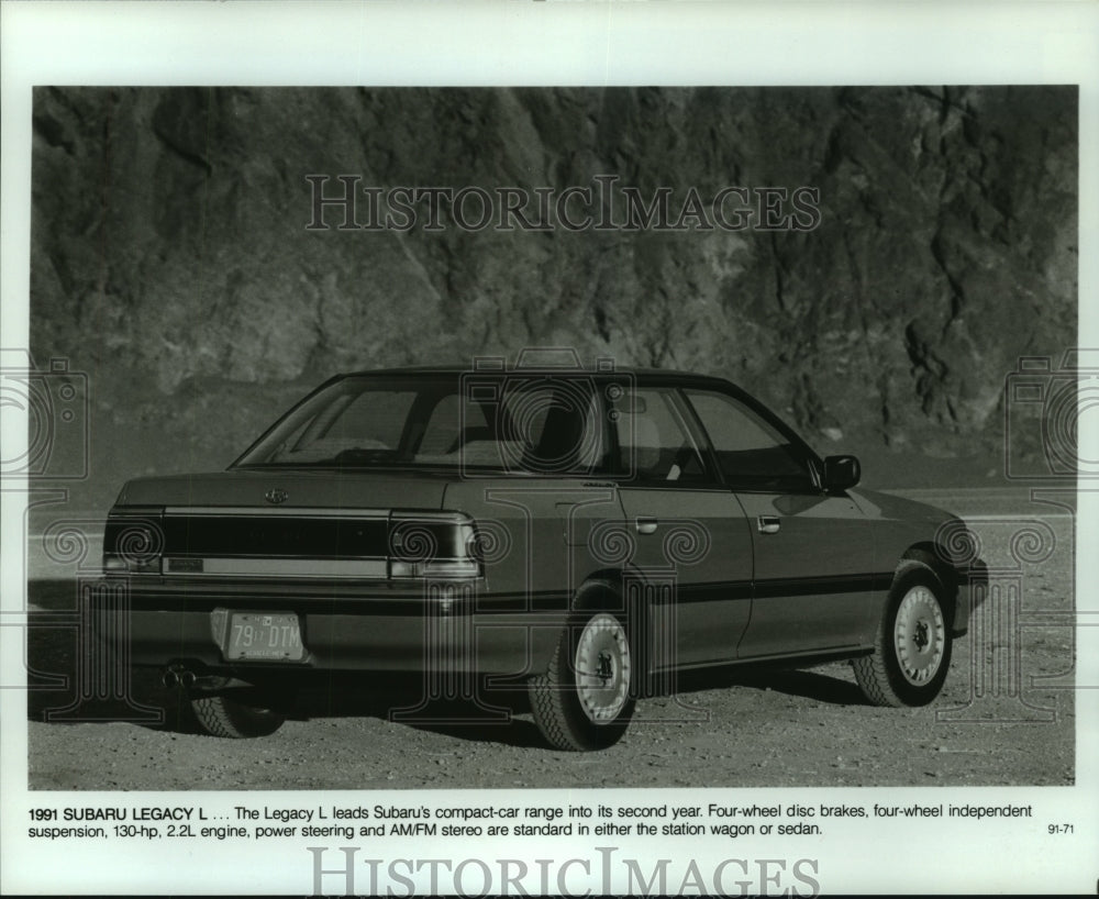 1990 The back of a new 1991 Subaru Legacy L compact-car - Historic Images