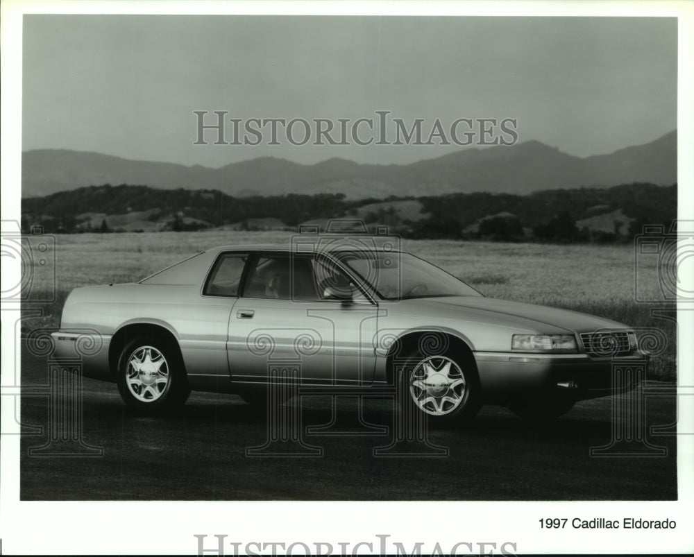 Press Photo The new 1997 Cadillac Eldorado car shown on the road - Historic Images