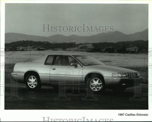 Press Photo The new 1997 Cadillac Eldorado car shown on the road - Historic Images