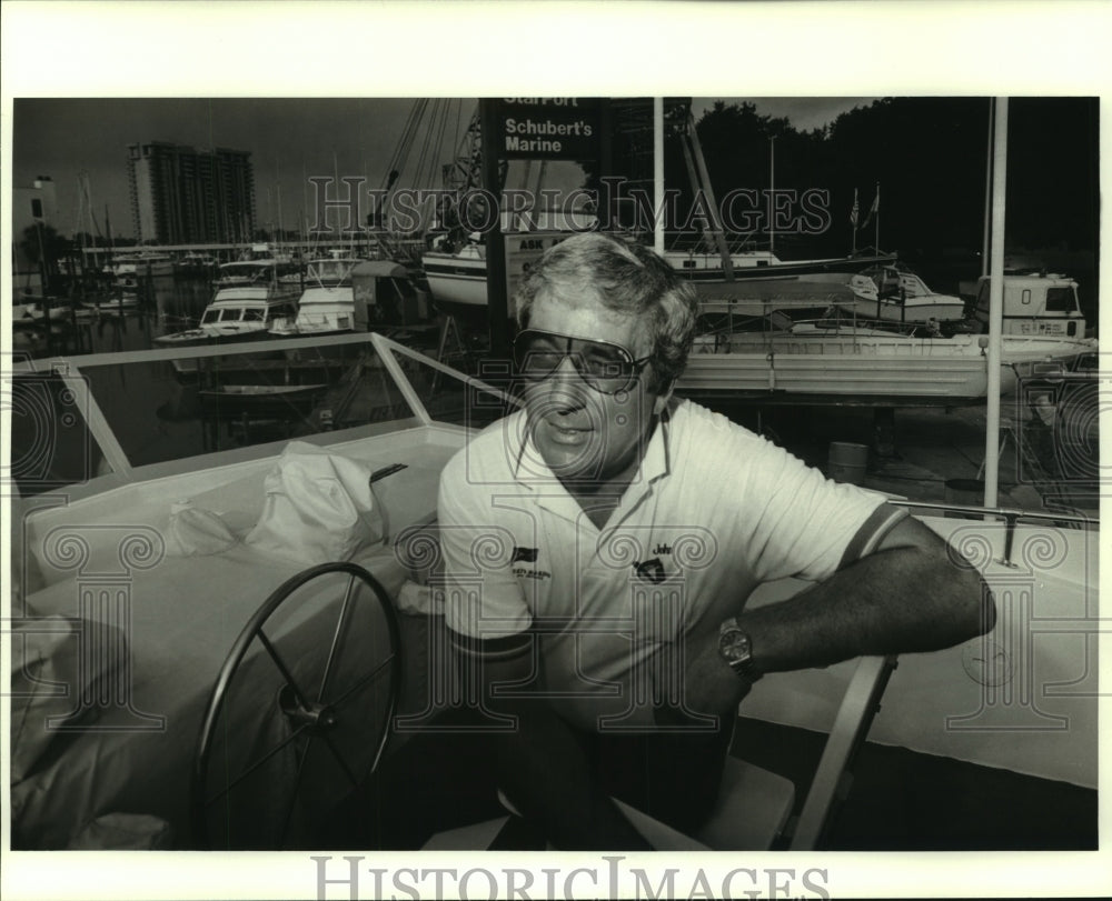 Press Photo Schubert&#39;s Marine president John Chantrey relaxes in a boat - Historic Images