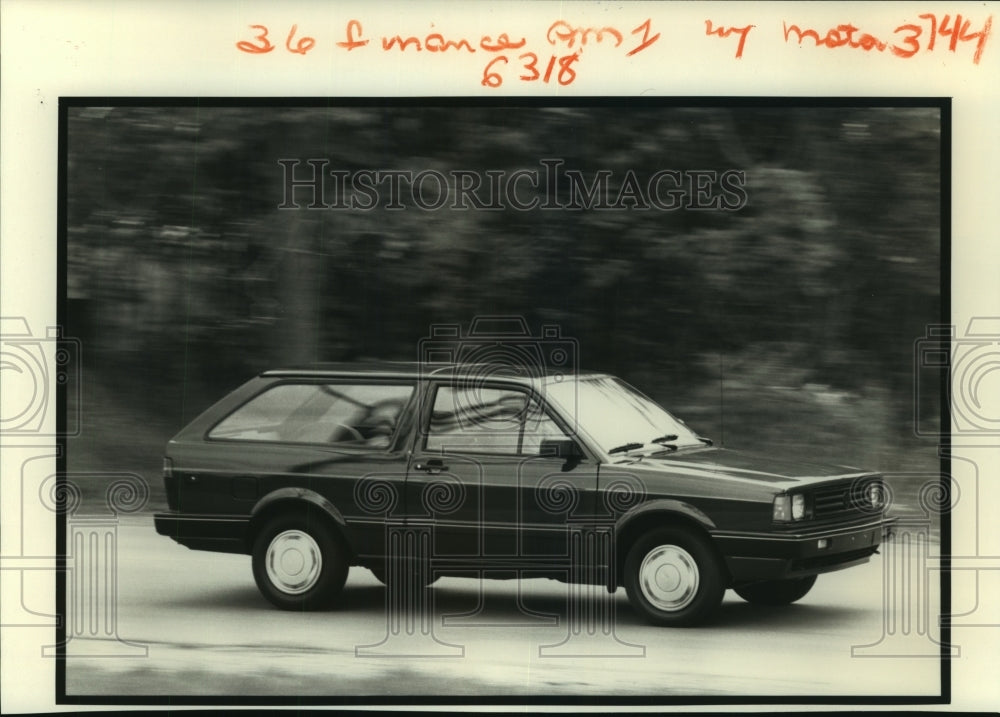 1988 Press Photo A new two-door Volkswagen Fox automobile on the road - Historic Images