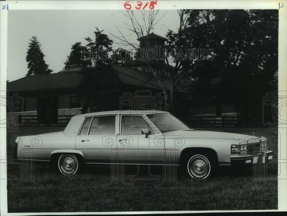 1986 A new four-door Cadillac Fleetwood Brougham automobile - Historic Images