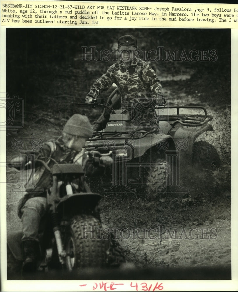 1987 Press Photo Joseph Favalora &amp; Bobby White ride their all-terrain vehicles - Historic Images