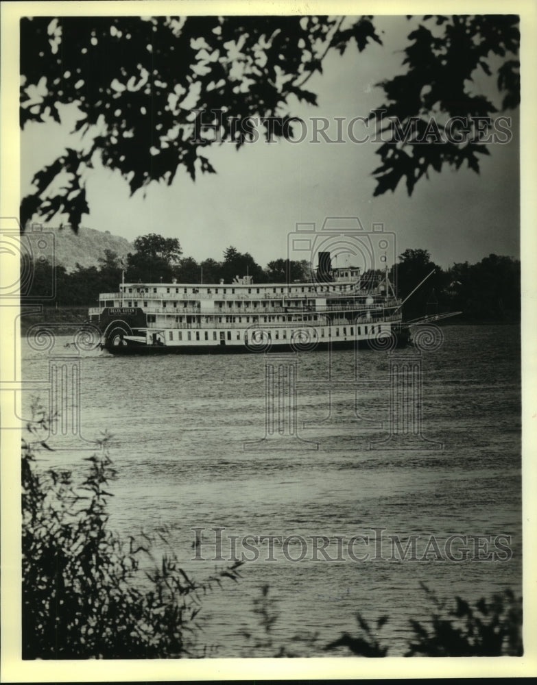 1980 A side view of the Delta Queen sternwheeler on the Mississippi - Historic Images