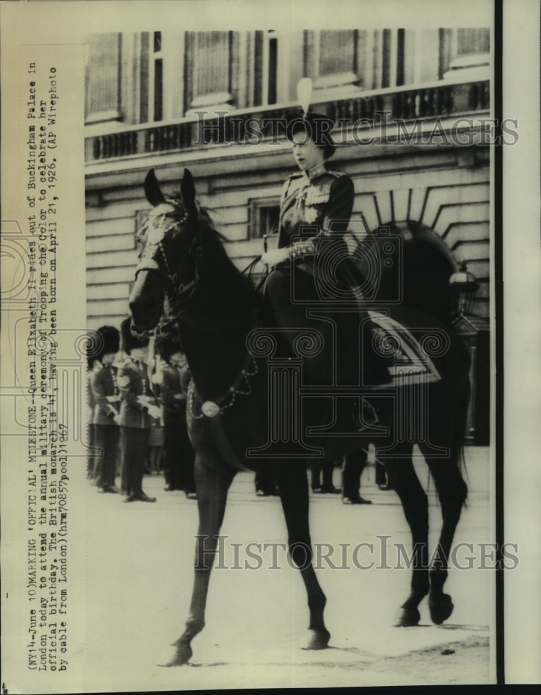 1967 Queen Elizabeth II rides out of Buckingham Palace in London - Historic Images