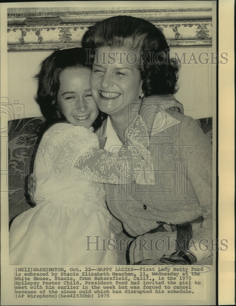 1975 Stacie Meacham, Epilepsy Poster Child, hugs Mrs. Ford. - Historic Images