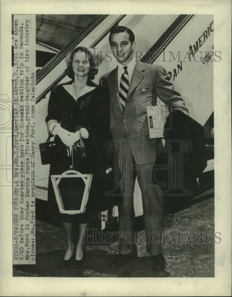 1947 Mr. &amp; Mrs. William Ford board plane for wedding trip to Bermuda - Historic Images