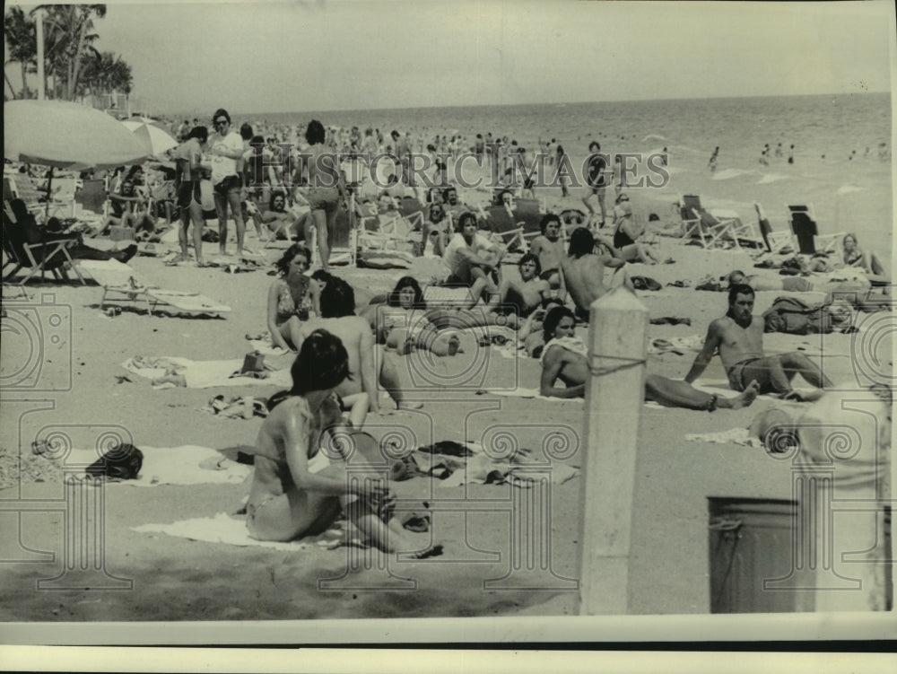 1975 College spring-breakers sunning at Fort Lauderdale, Florida - Historic Images