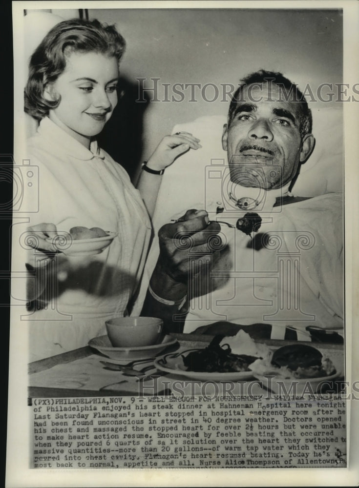 1959 Press Photo William Flanagan enjoys steak dinner after massive heart attack-Historic Images