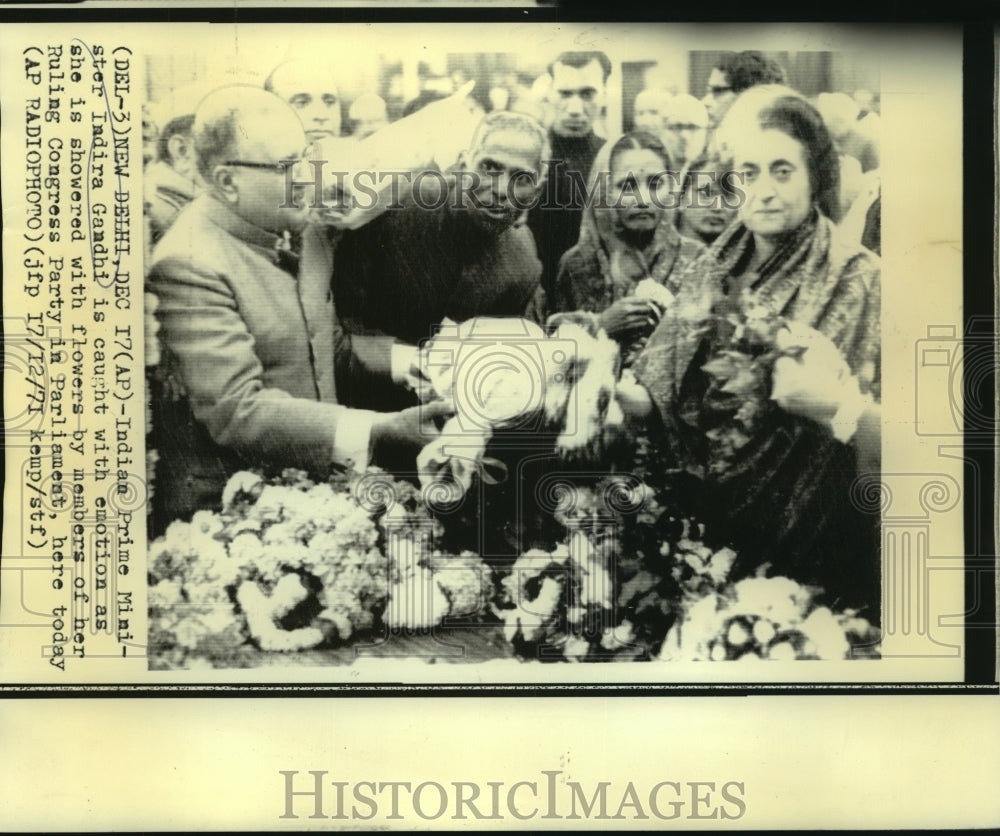 1971 Indian Prime Minister Indira Gandhi showered with flowers - Historic Images