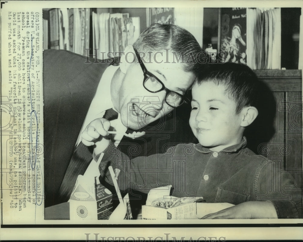 1968 David Rollins, eating cereal at Tremont School with Freeman - Historic Images