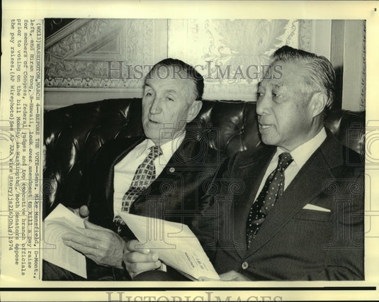 1974 Sens. Mansfield & Fong look over pay raise amendment bill - Historic Images