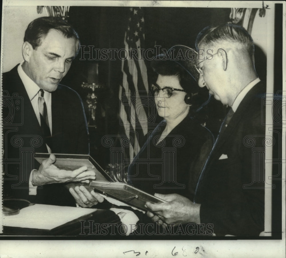 1966 Gov. M&#39;Keithen presents awards to Cpl. Bryan Gauthier&#39;s parents - Historic Images