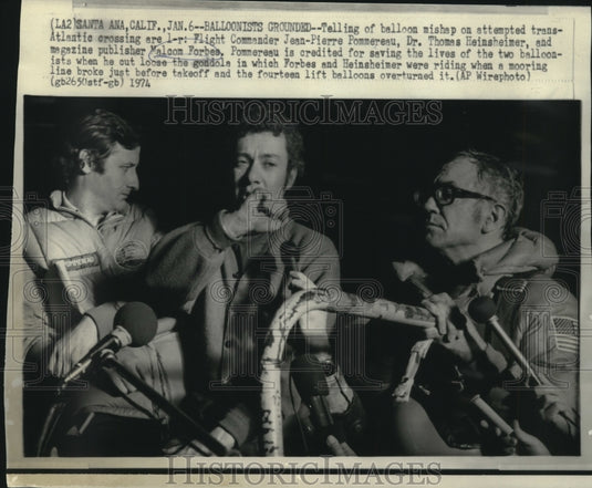 1974 Press Photo Malcolm Forbes & others tell of balloon mishap - now04129 - Historic Images
