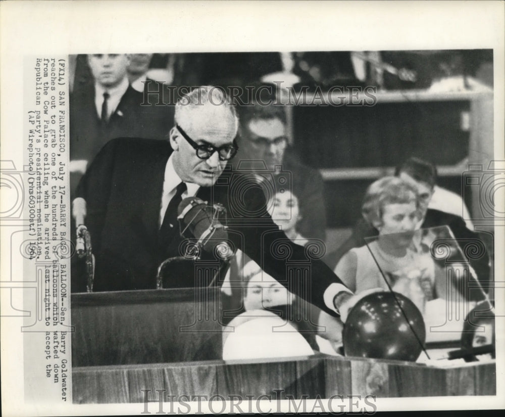 1964 Senator Barry Goldwater grabs a balloon at National Convention - Historic Images