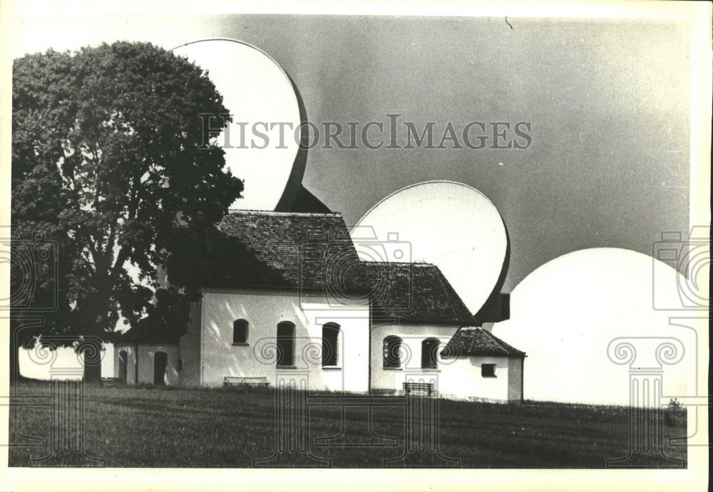 1984 Bavaria chapel with German radio station saucer-shaped antennae - Historic Images