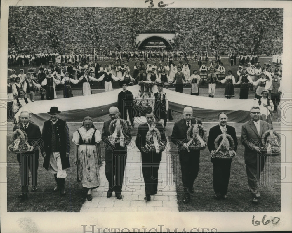 1959 Polish leader Gomulka leads procession at Warsaw Stadium - Historic Images