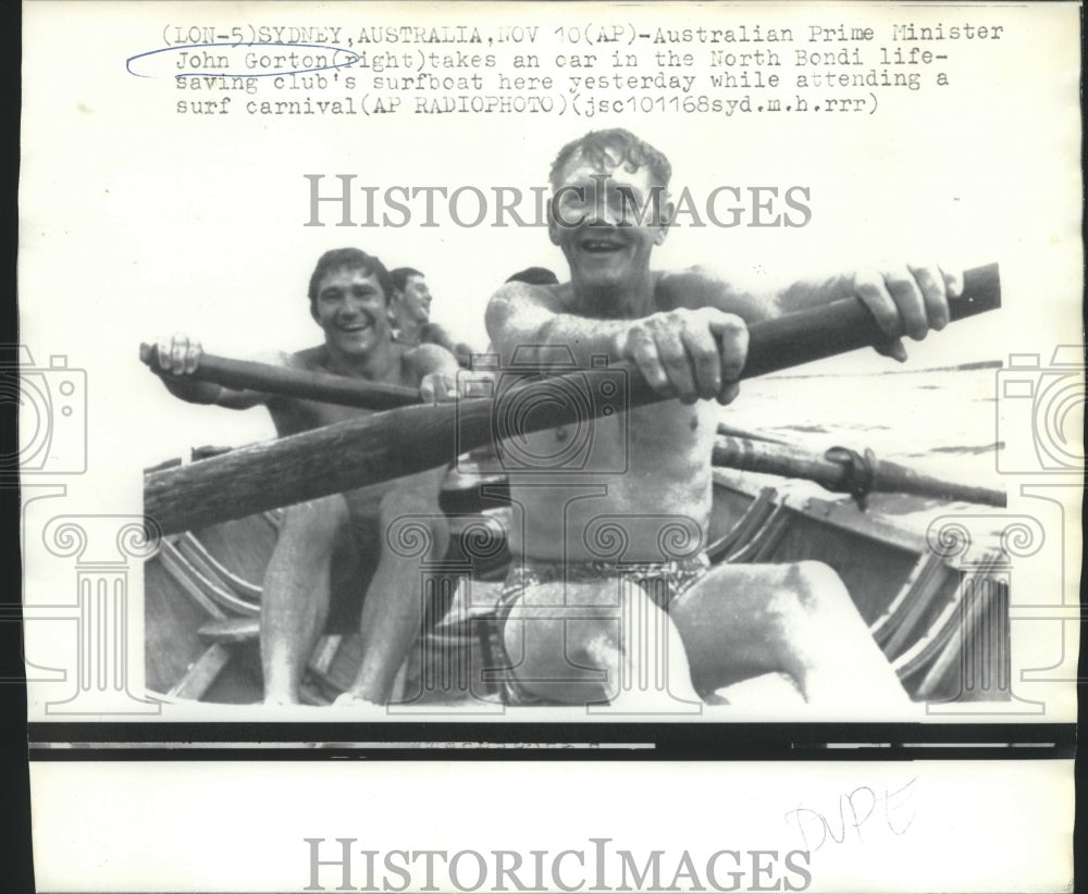 1968 Australian Prime Minister John Gorton takes an oar in Sydney - Historic Images