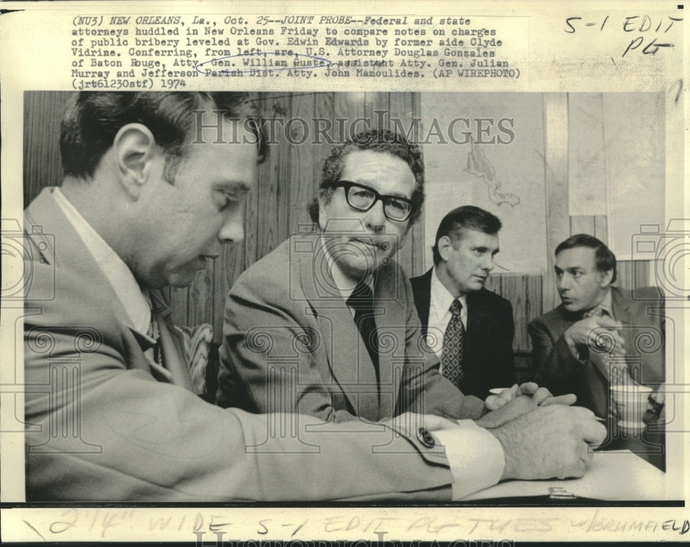 1974 Attorney Gen. William Guste &amp; others confer over probe notes - Historic Images