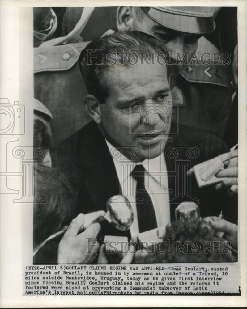 1964 Uruguay-Ousted President Joao Goulart of Brazil with newsmen. - Historic Images