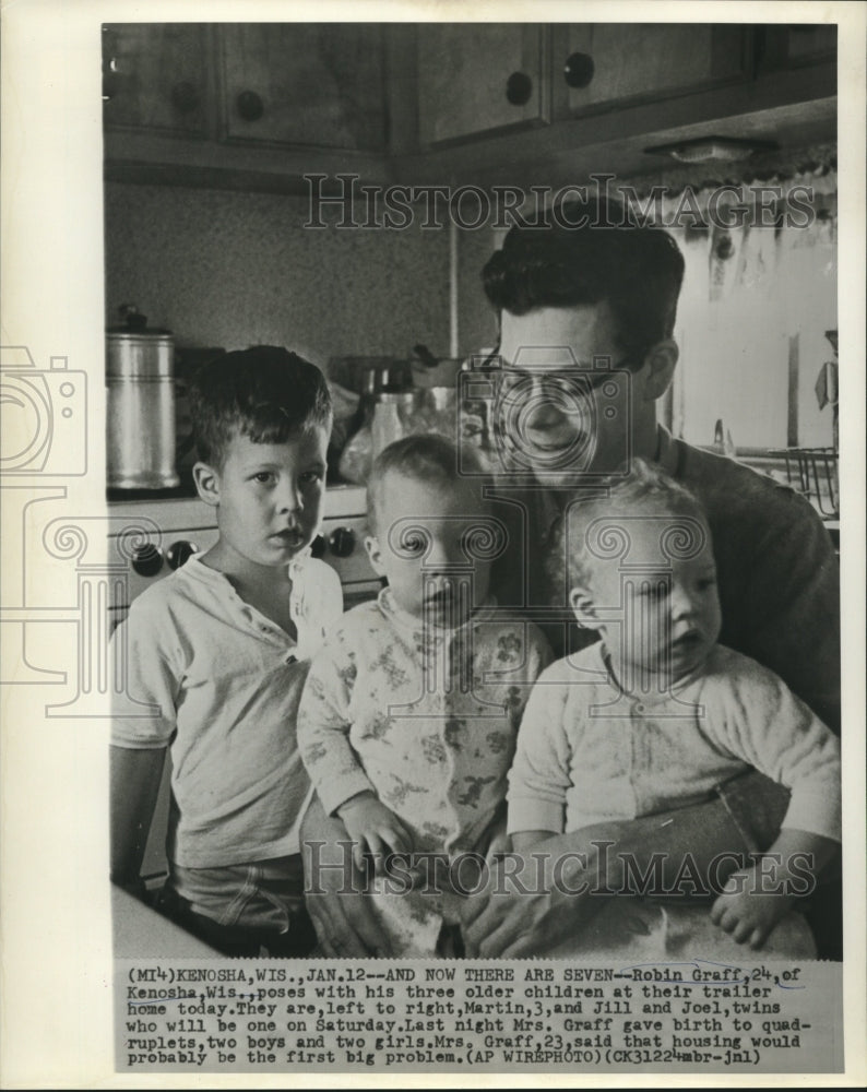 1965 Robin Graff, father of quadruplets shown with older children. - Historic Images