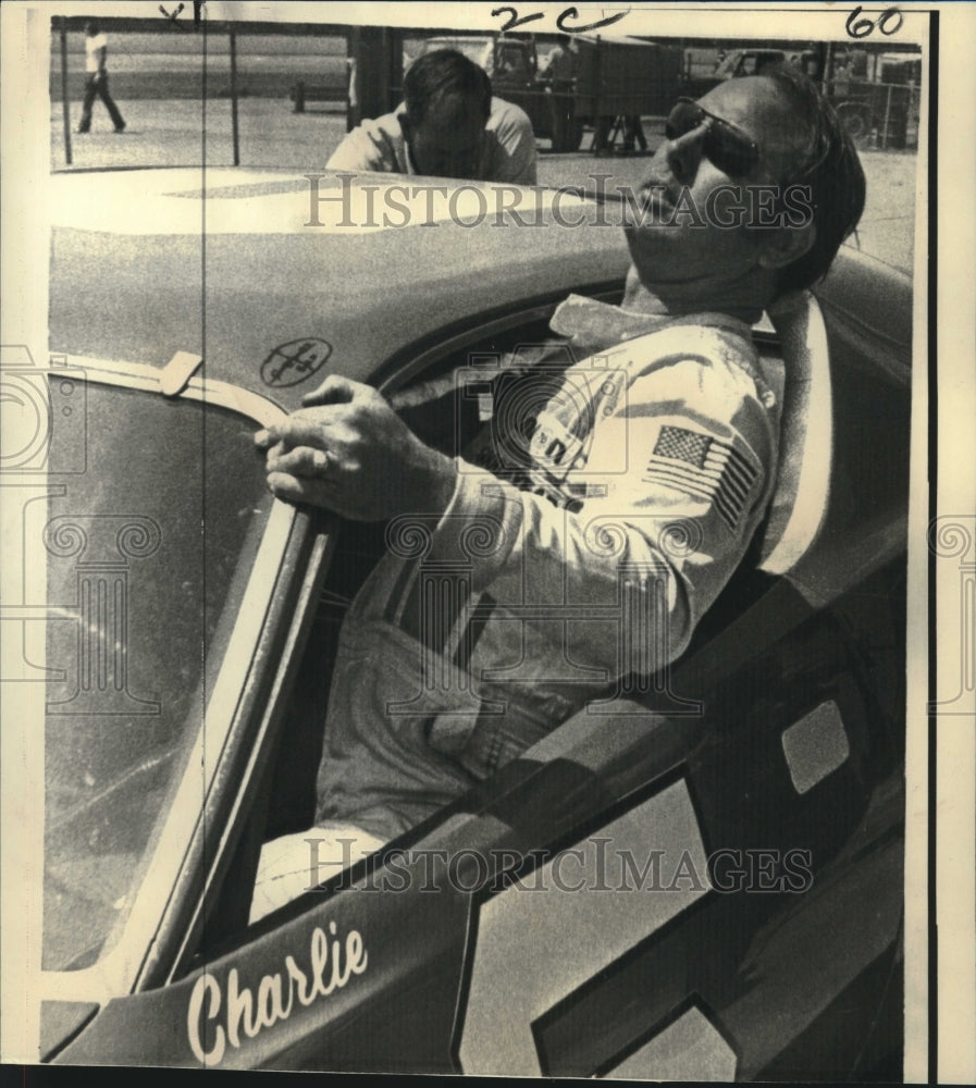 1972 Charlie Glotzbach climbs from race care at Charlotte Speedway - Historic Images