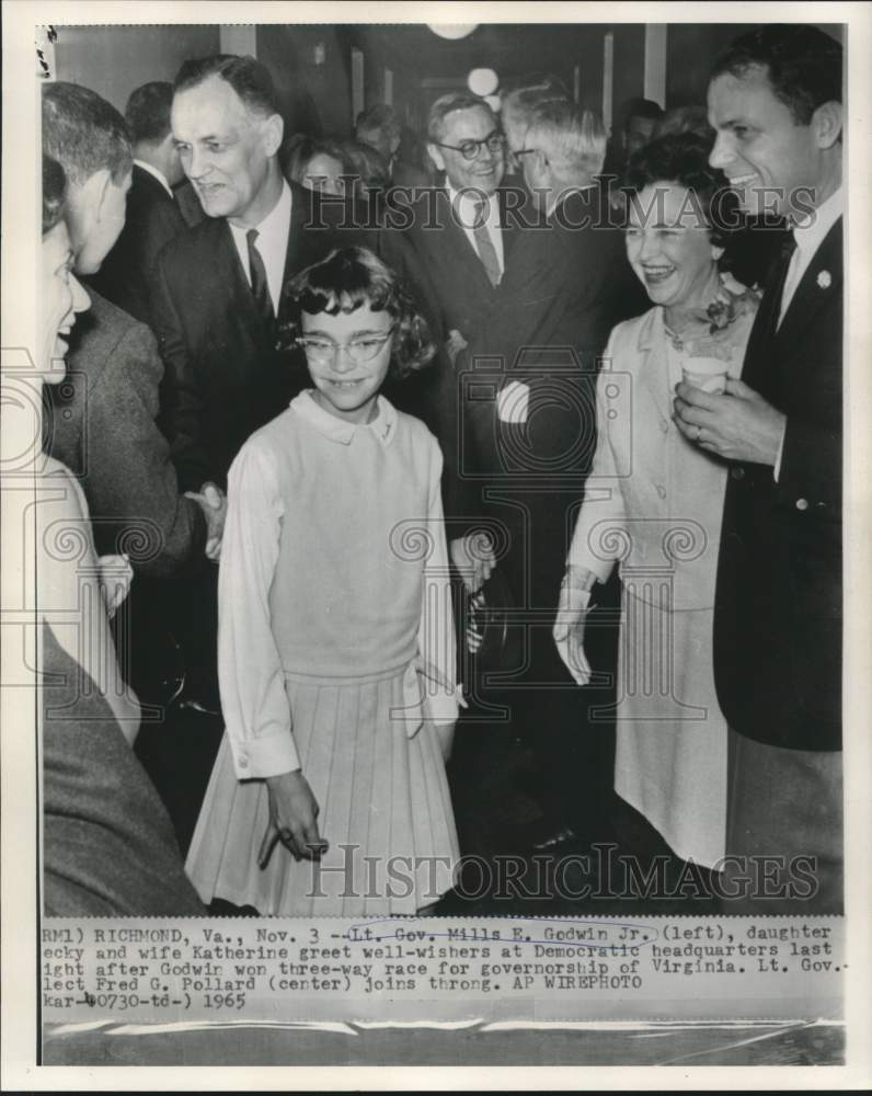 1965 Lt. Governor Godwin with wife &amp; daughter greet well-wishers - Historic Images