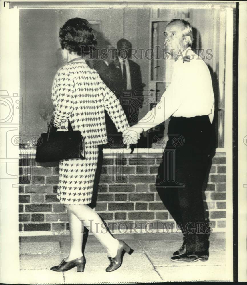 1970 Hijacked BOAC pilot, Capt. Gouldbourn &amp; wife leave airport - Historic Images