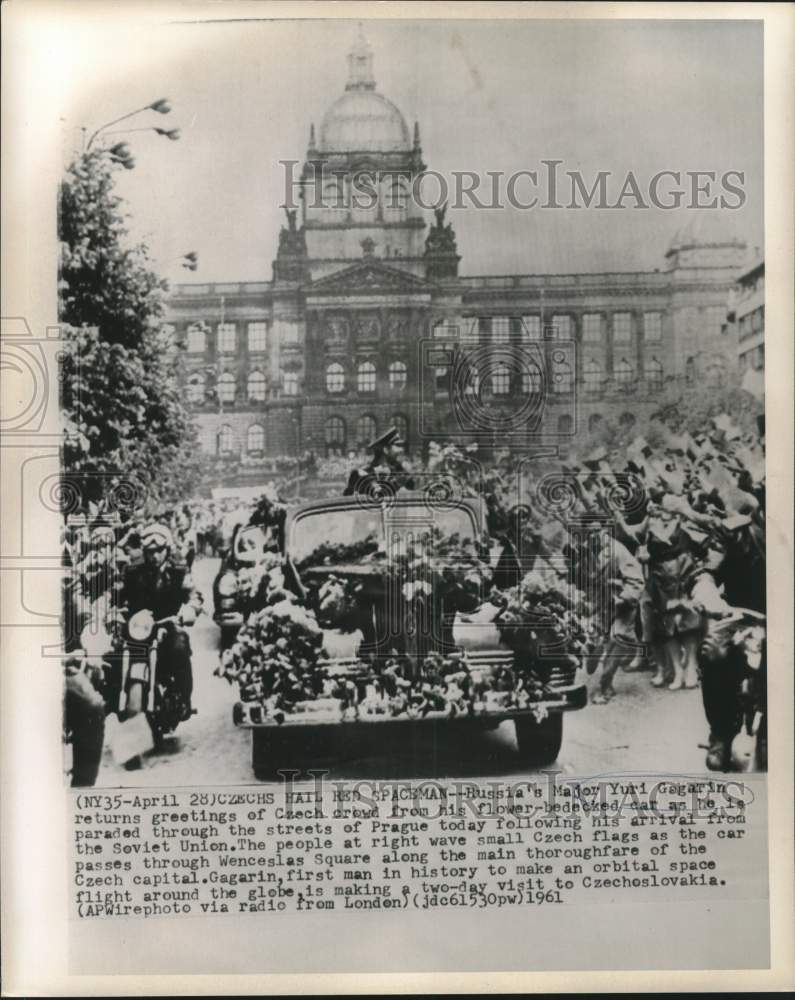 1961 Major Yuri Gagarin greeted by Czech crowd from flowered car - Historic Images