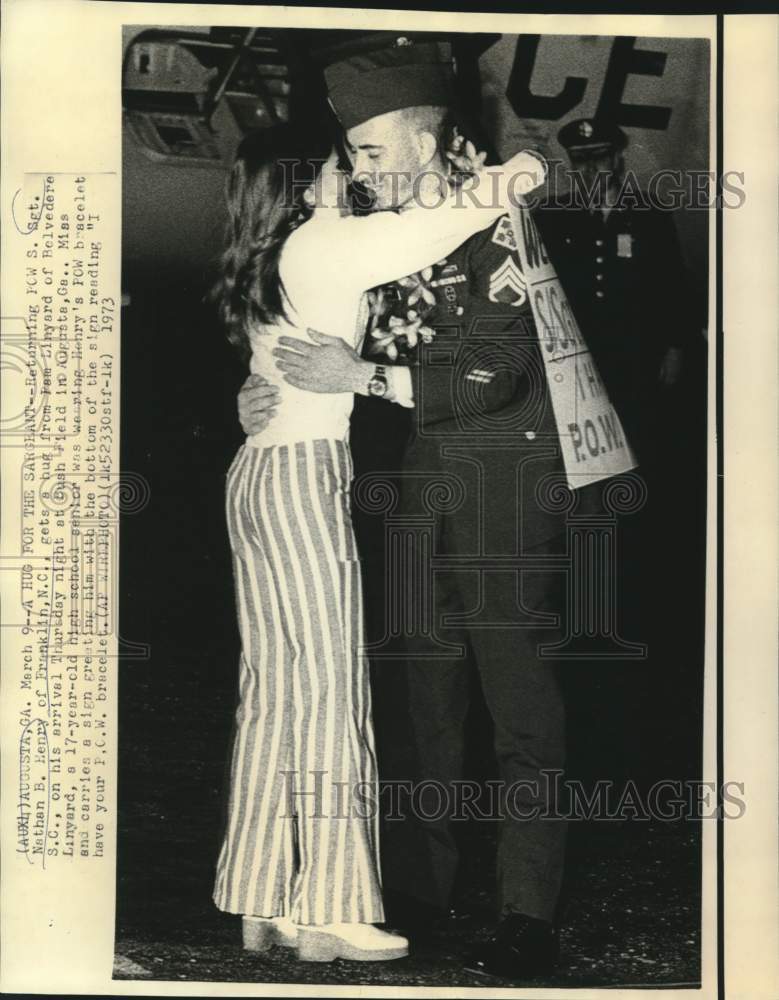 1973 Returning POW S/Sgt. Nathan Henry greeted at Bush Field - Historic Images