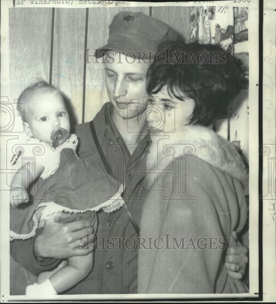 1968 Cary L. Hervey, returning soldier, with wife and daughter. - Historic Images