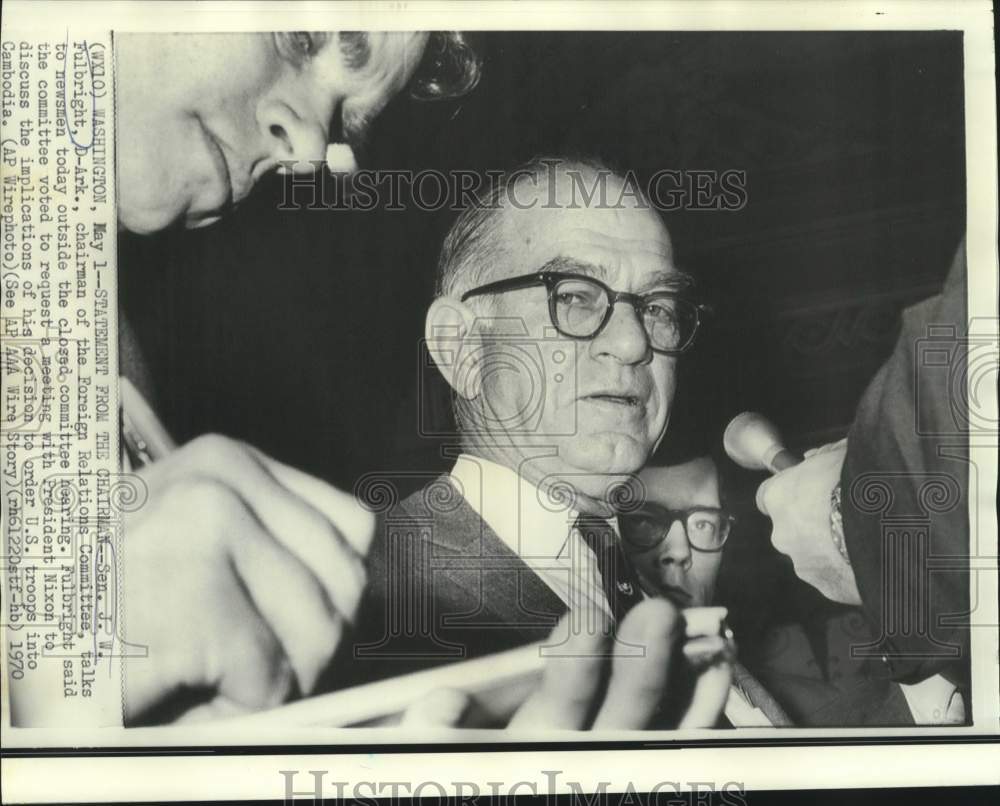 1970 Senator J.W. Fulbright with newsmen outside closed hearing - Historic Images