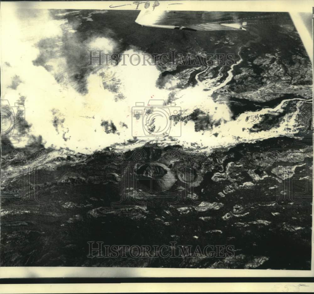 1975 Glowing lava flows from Mauna Loa Volcano&#39;s eruption in Hawaii - Historic Images