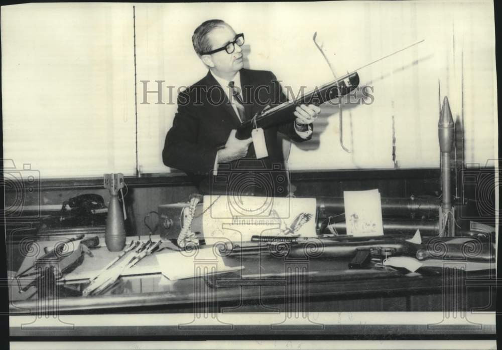 1966 Press Photo New York District Attorney Nat Hentel holds seized crossbow.-Historic Images