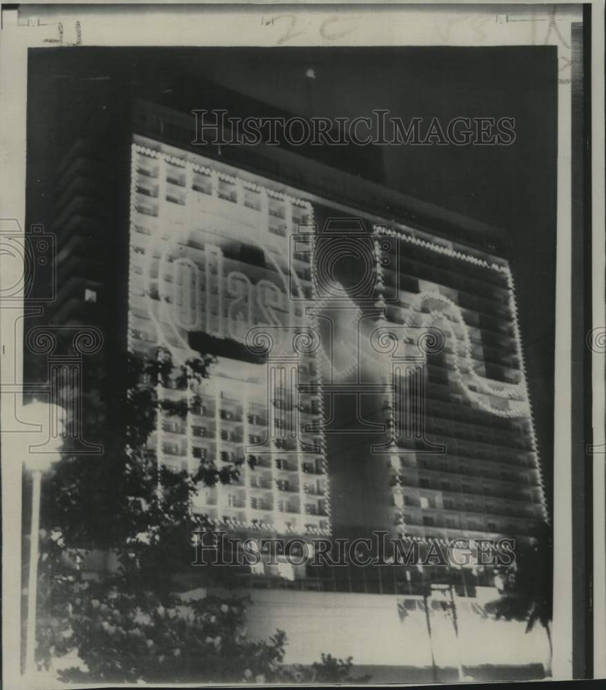 1967 Havana&#39;s Habana Libre&#39;s neon sign flashes meeting of OLAS - Historic Images