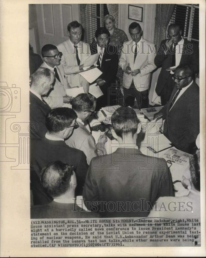 1961 Assistant Press Secretary Andrew Hatch with newsmen - Historic Images