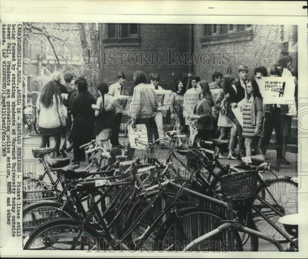 1969 Harvard University students picket outside Sever Hall - Historic Images