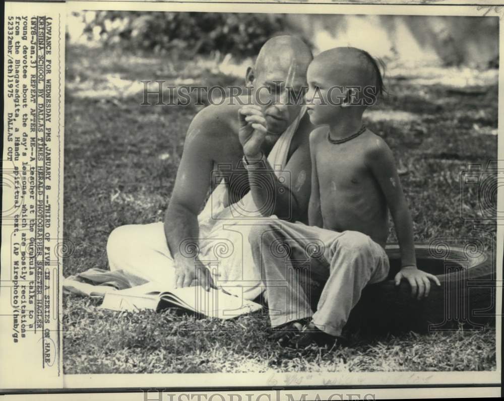 1975 Press Photo Teacher at Hare Krishna school teaches young student-Historic Images