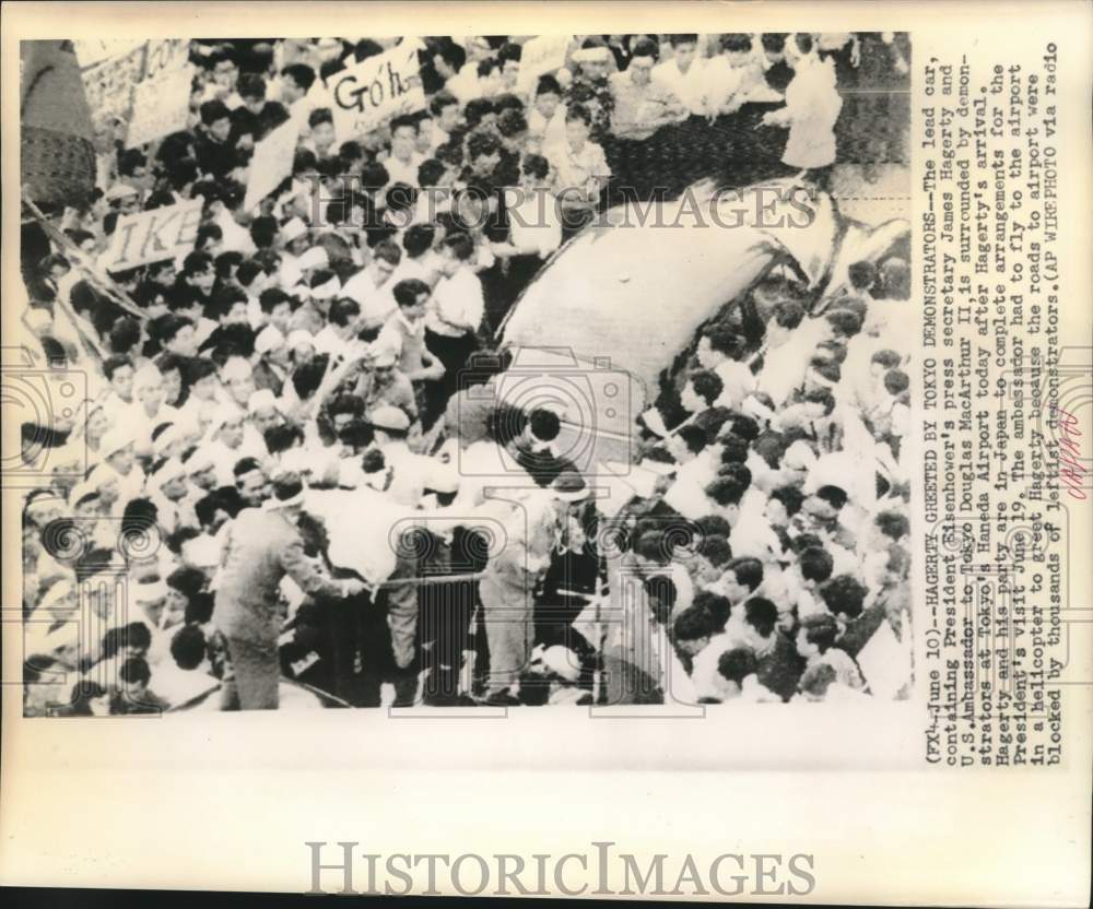 1960 Press Secretary James Hagerty greeted in Tokyo by demonstrators - Historic Images