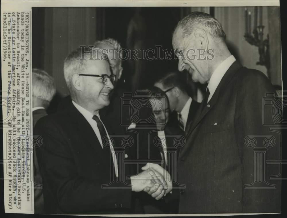 1966 President Johnson shakes hands with Gordon at White House - Historic Images