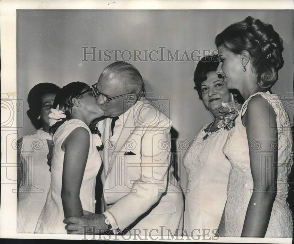 1969 Representative Edward Hebert gets kiss from granddaughter Kim - Historic Images