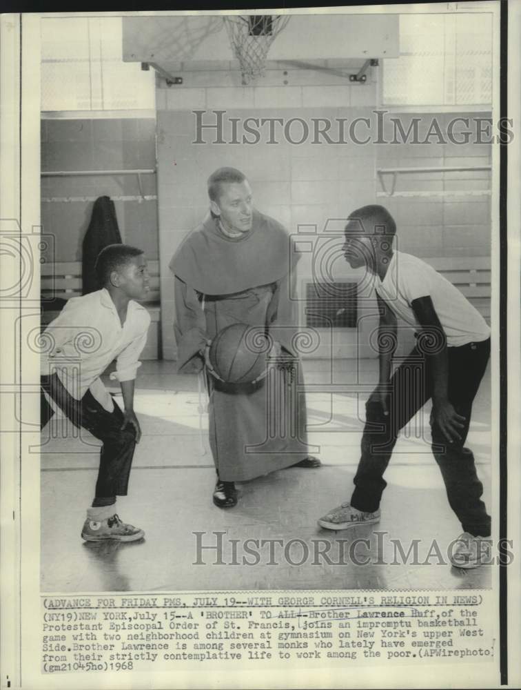 1968 Brother Lawrence Huff plays basketball with New York children - Historic Images